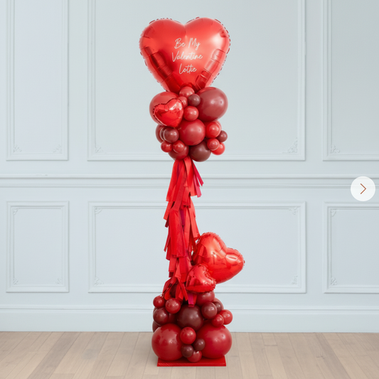 Columna de globos con corazón