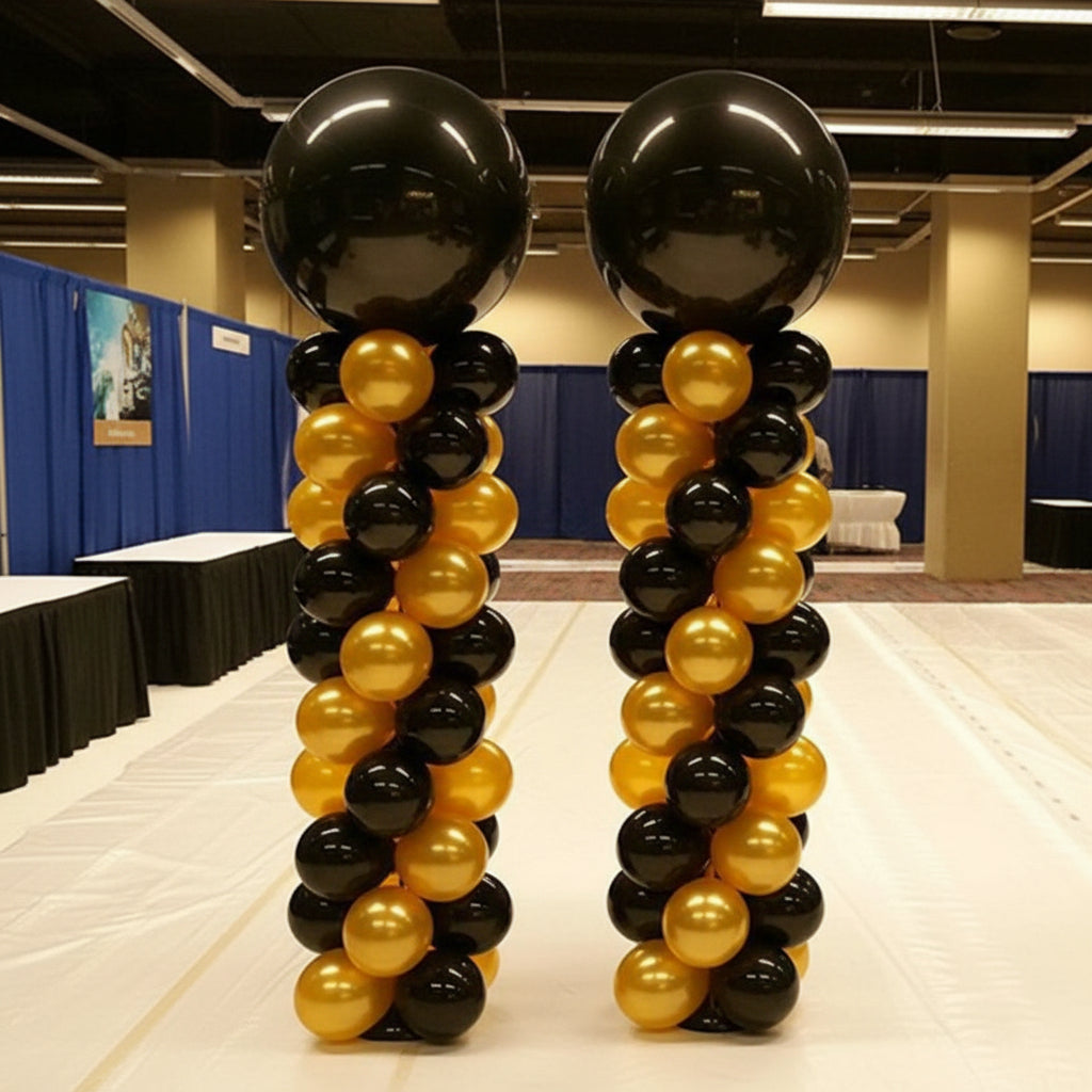 Columna de globos negros y dorados