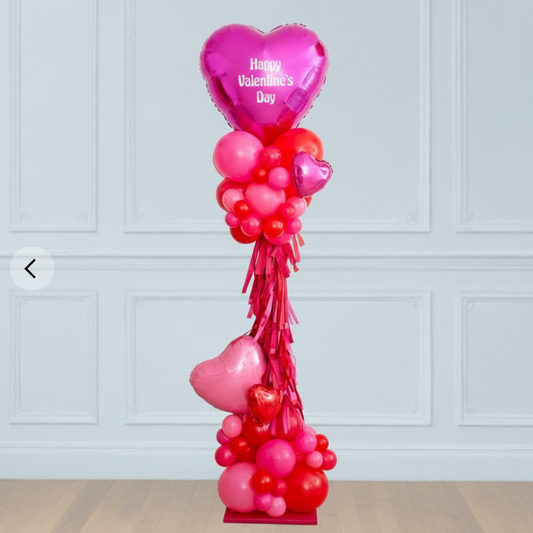 Columna de globos con corazón
