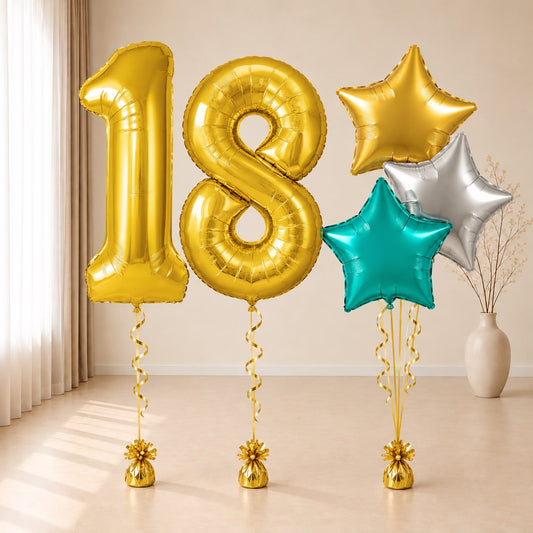 Composición de globos con números 18 dorados y estrellas dorada, plateada y turquesa, con cintas y contrapesos.